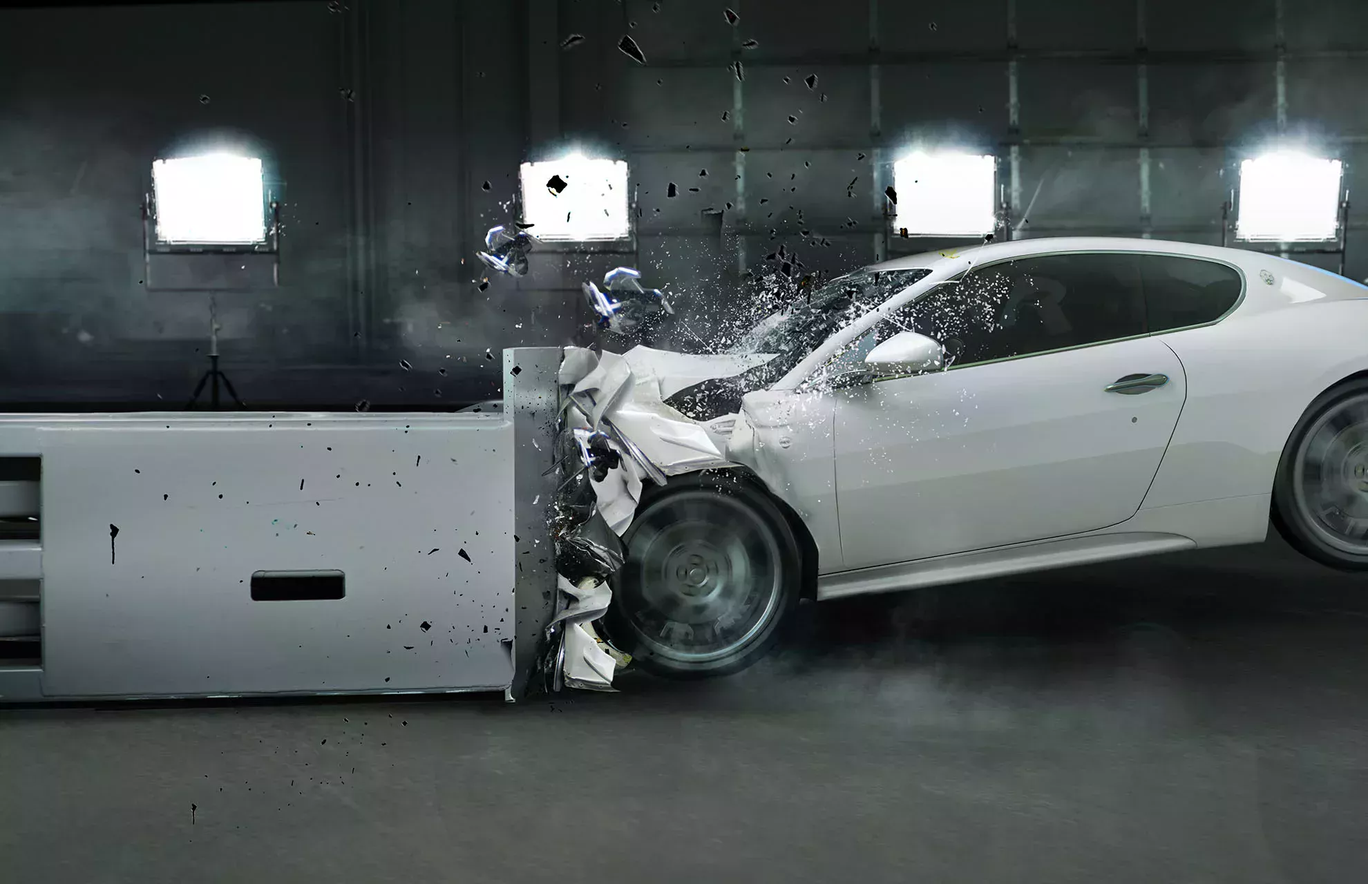 Car in a crash test; the front of the car hits a bumper