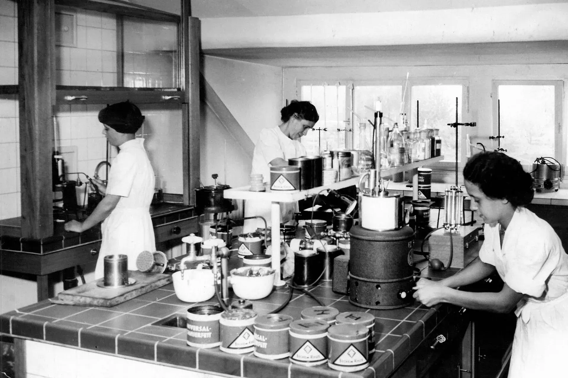 Ales laboratory with three lab assistants