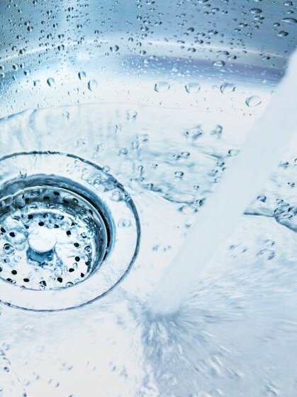 Stainless steel tray with drain