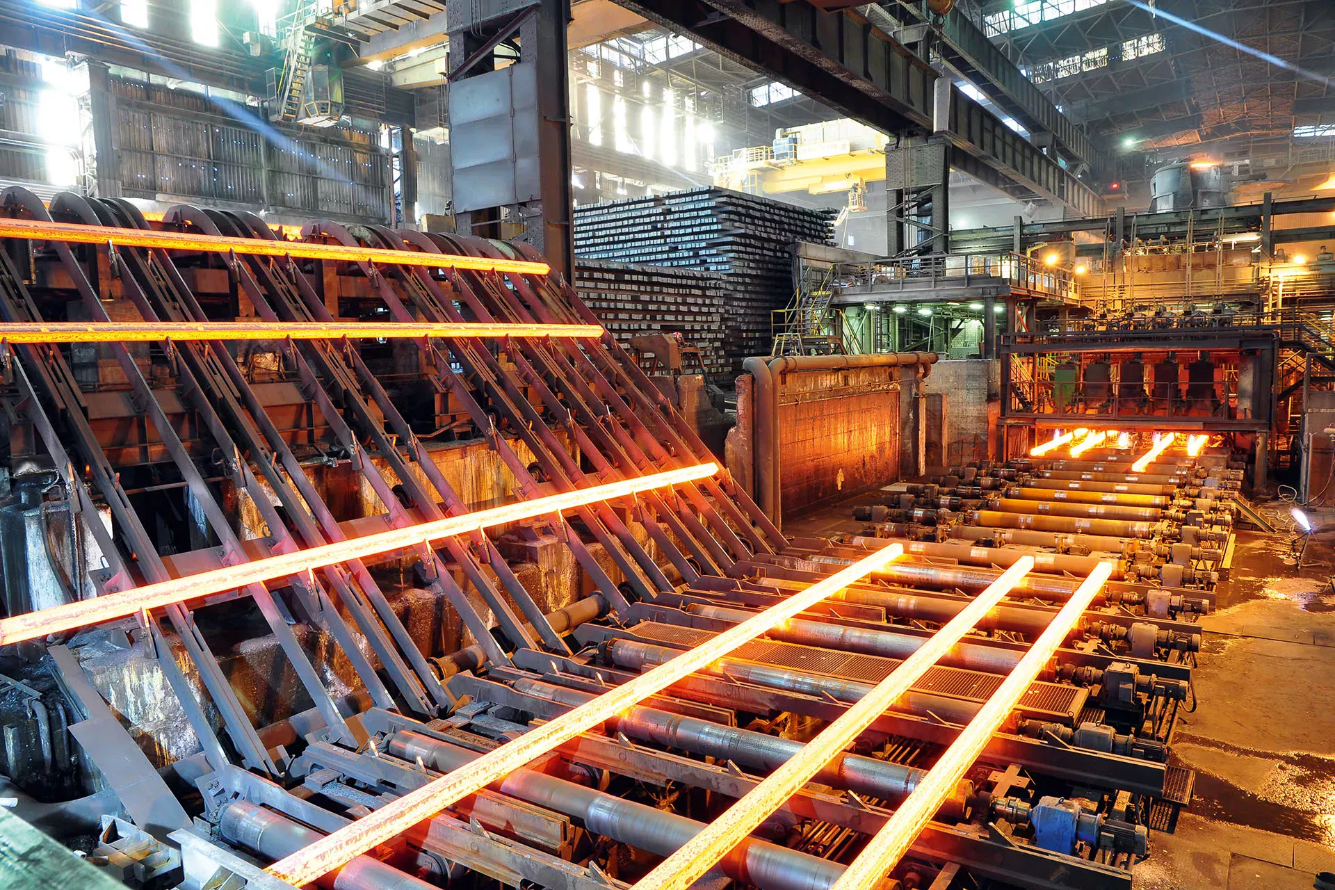 Glowing steel on conveyor belts